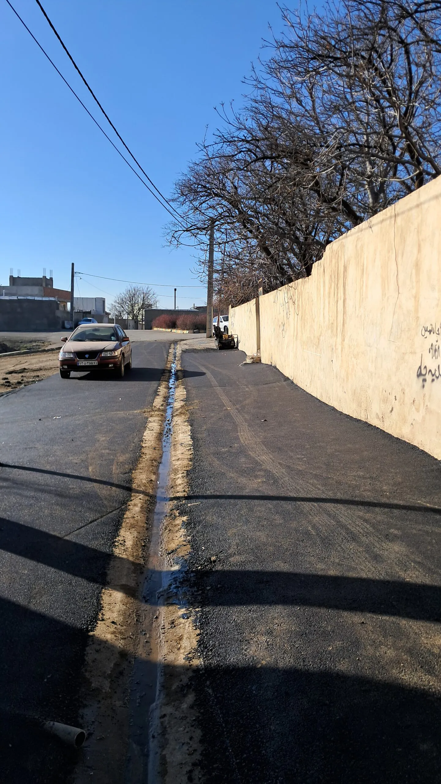 زیرسازی و آسفالت ریزی کوچه های محله امام حسین(ع)