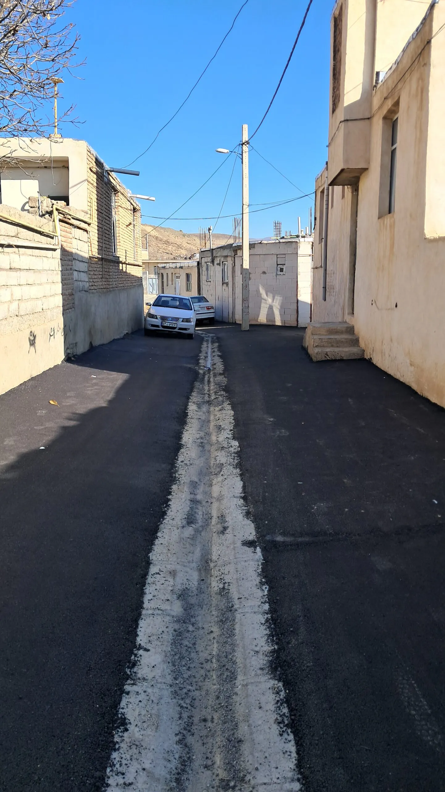 زیرسازی و آسفالت ریزی کوچه های محله امام حسین(ع)