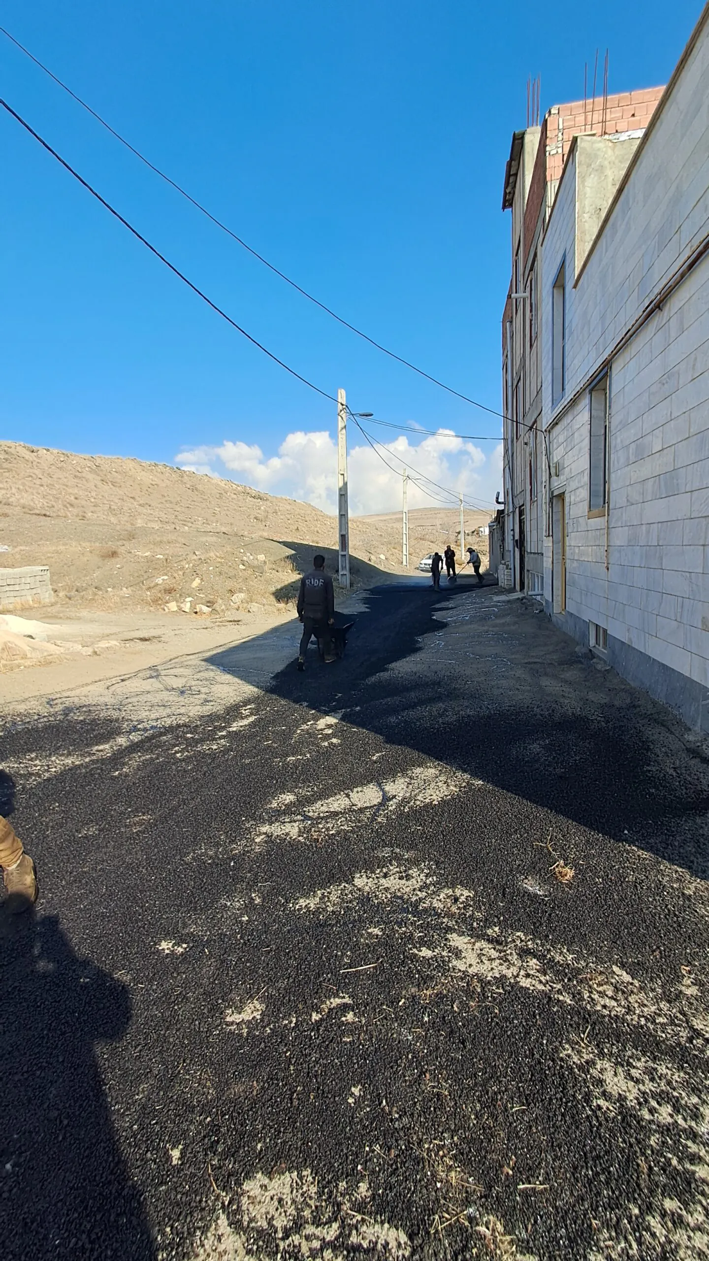 زیرسازی و آسفالت ریزی کوچه های محله امام حسین(ع)